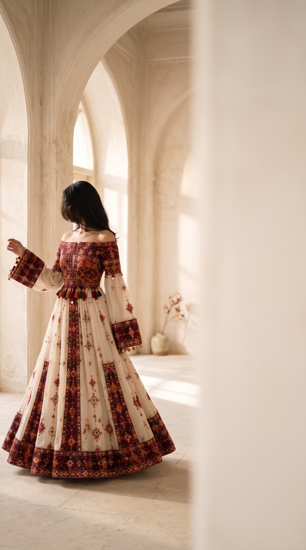 Shahdokht gown in a sunlit arched heritage hall